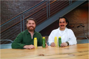 Development chief Ross Martin-Wells (left) and head chef Rafaed Pozzi of Lancaster's Rijuice show off some of the company's "life in a bottle." ((Vance Lehmkuhl / Staff))