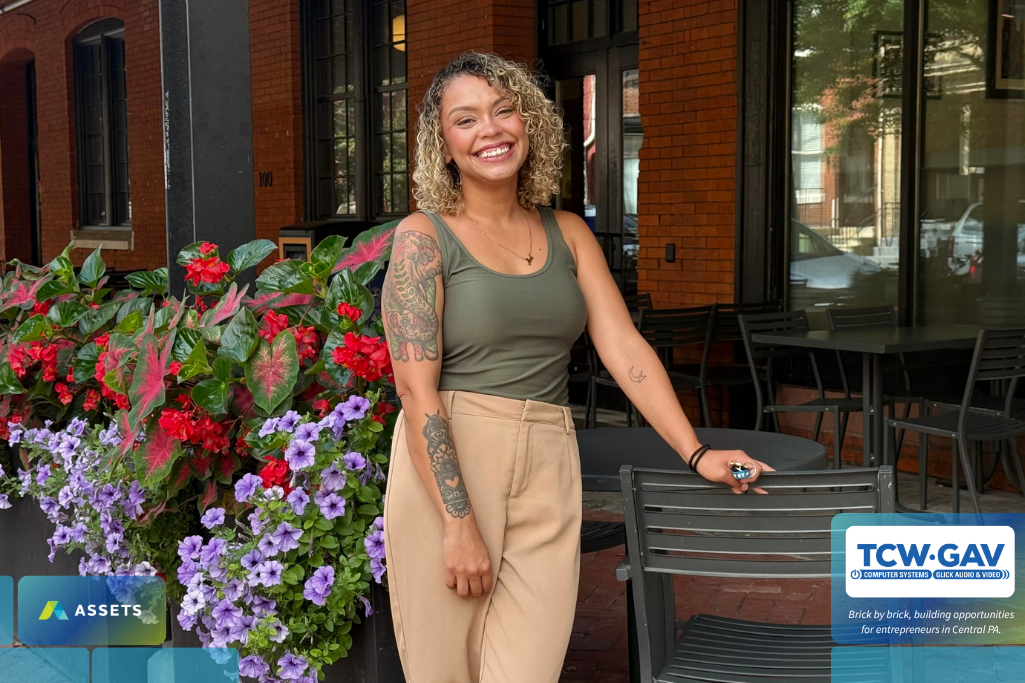 Owner of Socials Fairy, Ariana Garcia posing in front of Southern market Lancaster