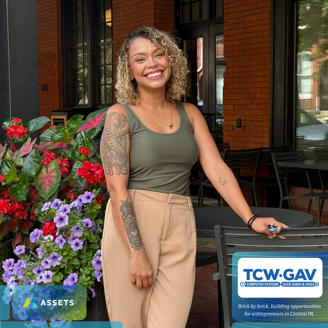 Owner of Socials Fairy, Ariana Garcia posing in front of Southern market Lancaster